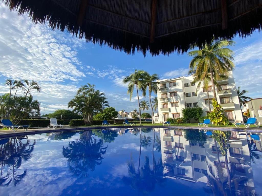 Hermoso Condominio Suites Las Palmas Con Alberca マンサニージョ エクステリア 写真